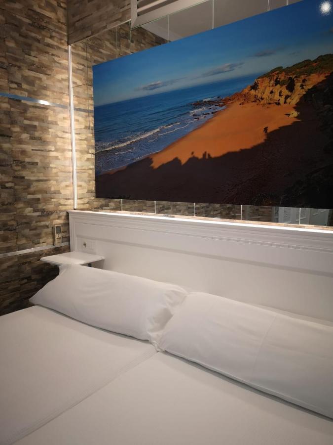 Hostal Costa De La Luz โกนิล เด ลาฟรอนเตรา ภายนอก รูปภาพ